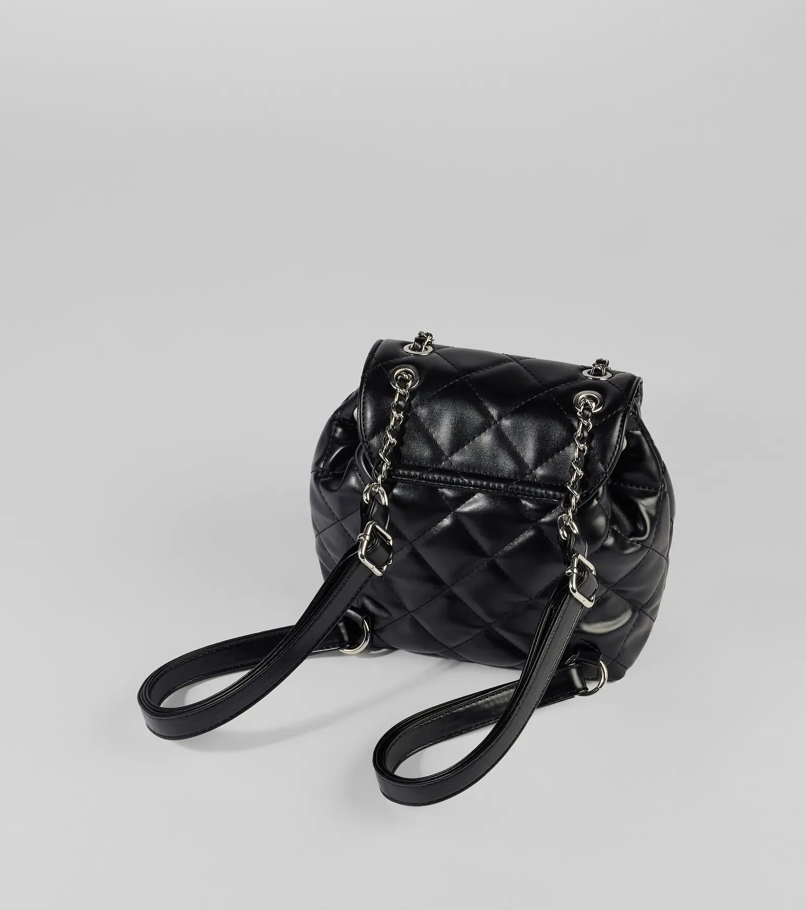 Edgy Quilted Faux Leather Mini Backpack