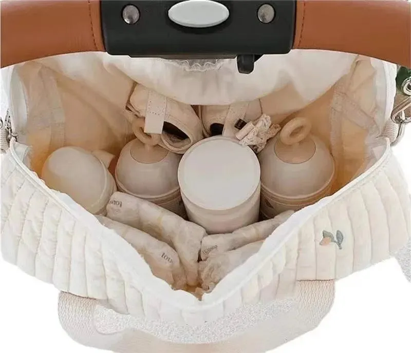 Pink tulip quilted baby pram bag