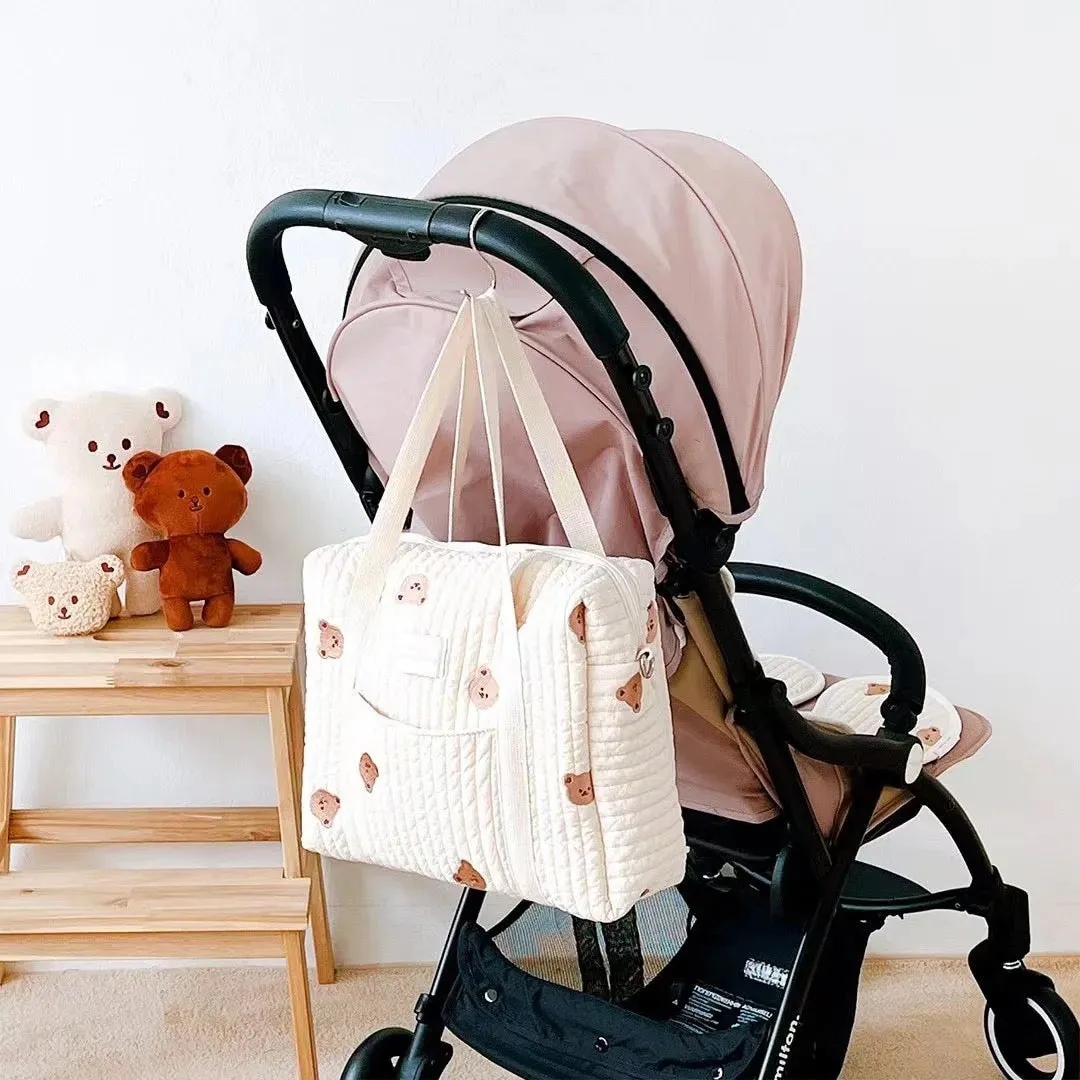 Pink tulip quilted baby pram bag