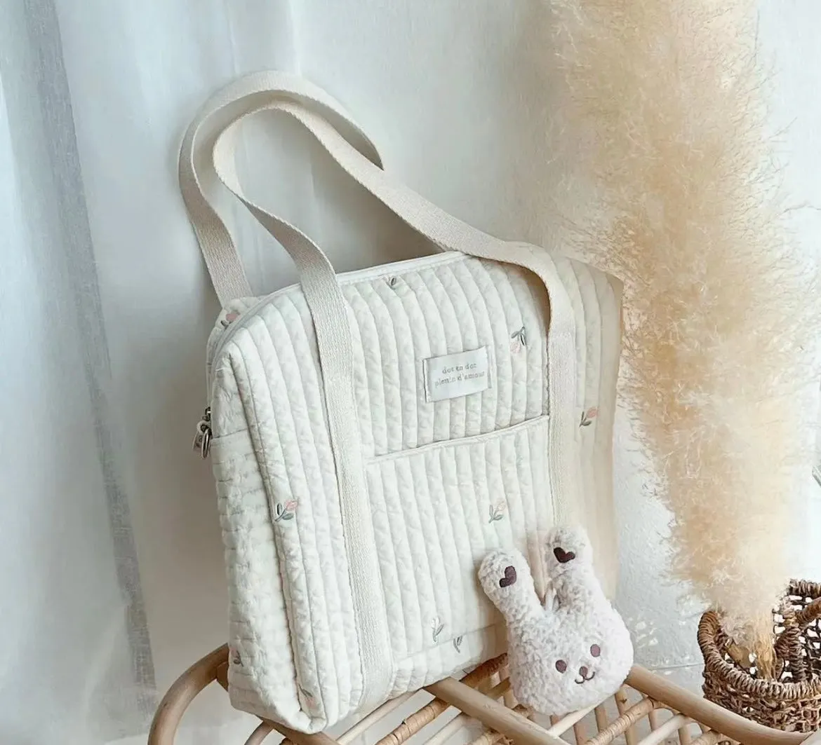 Pink tulip quilted baby pram bag