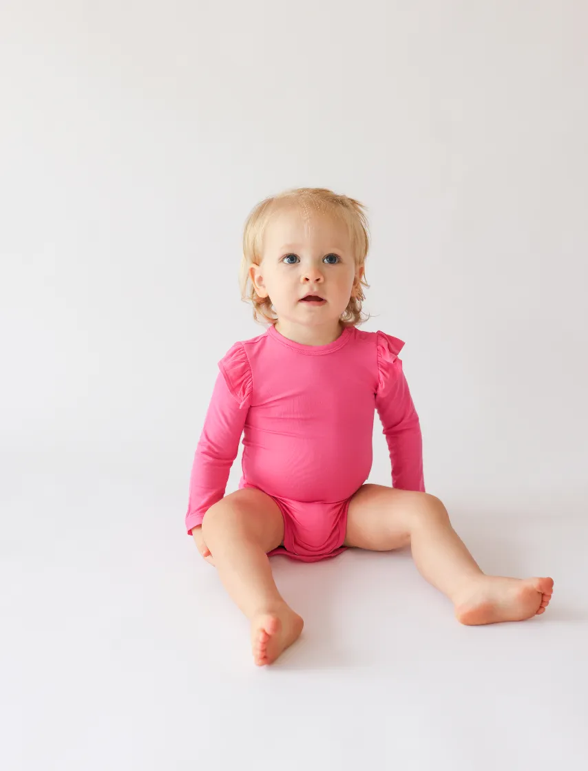 Posh Peanut Long Sleeve Girls Ruffled Bodysuit in Posh Hot Pink
