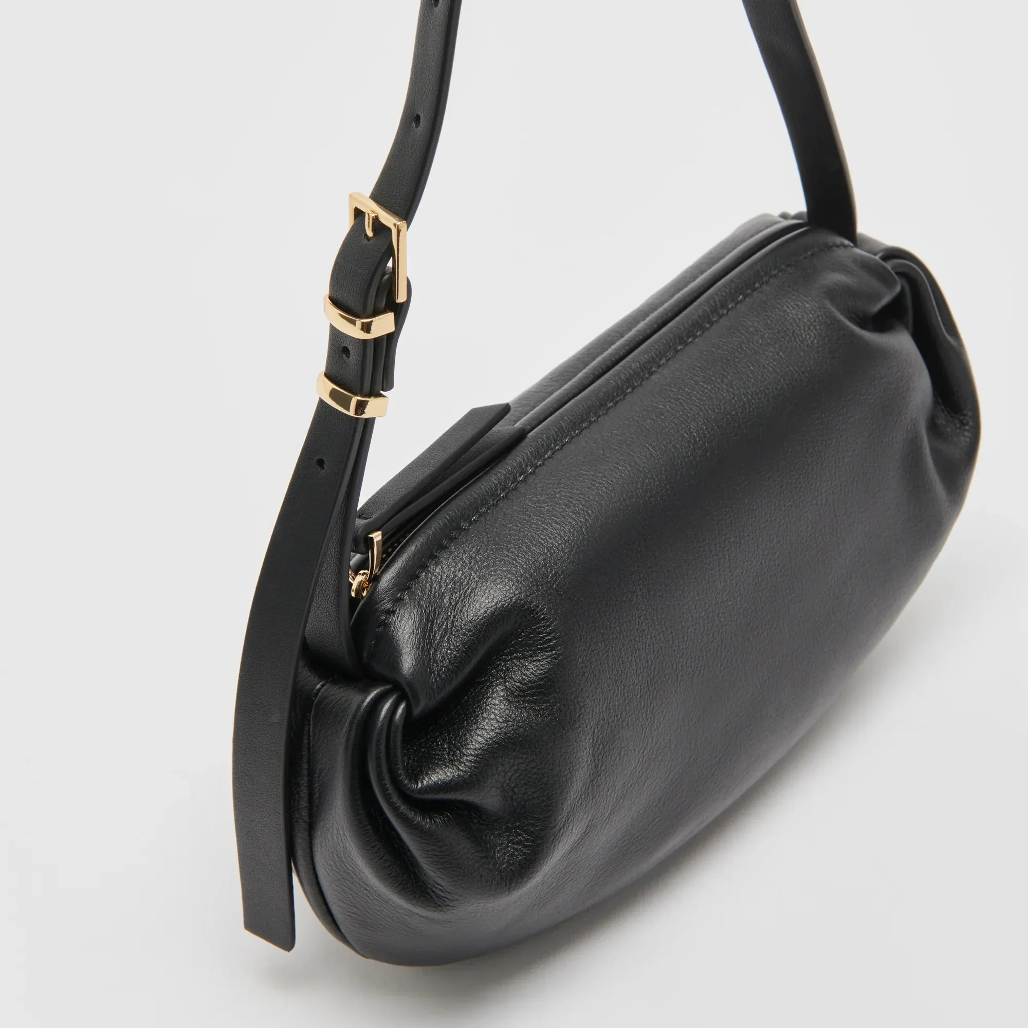 The Livi Shoulder Bag by Dolce Vita - Black Leather