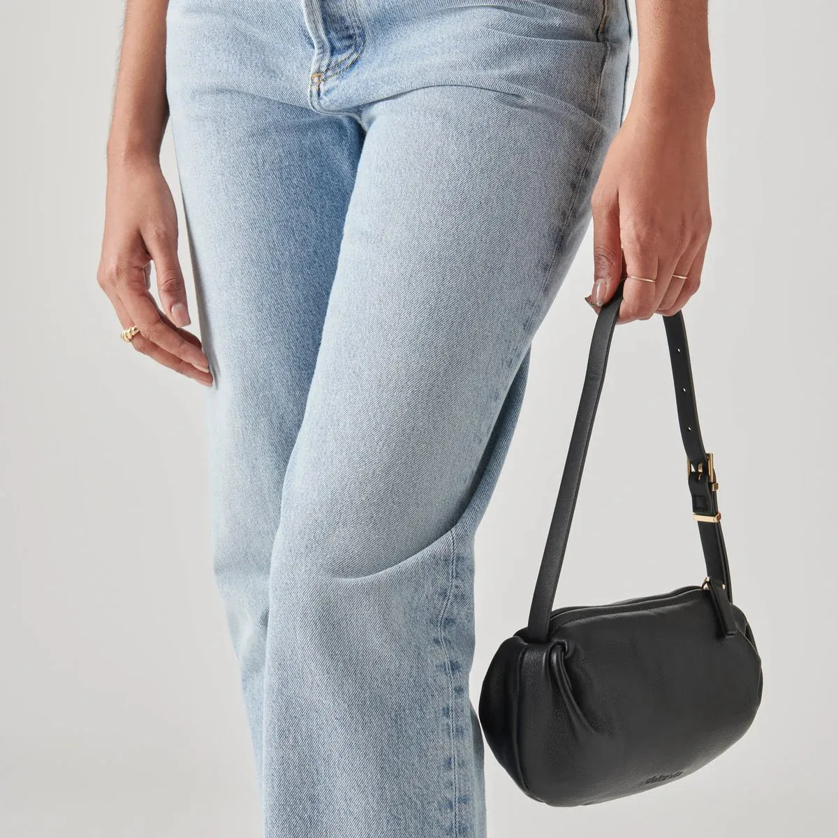 The Livi Shoulder Bag by Dolce Vita - Black Leather