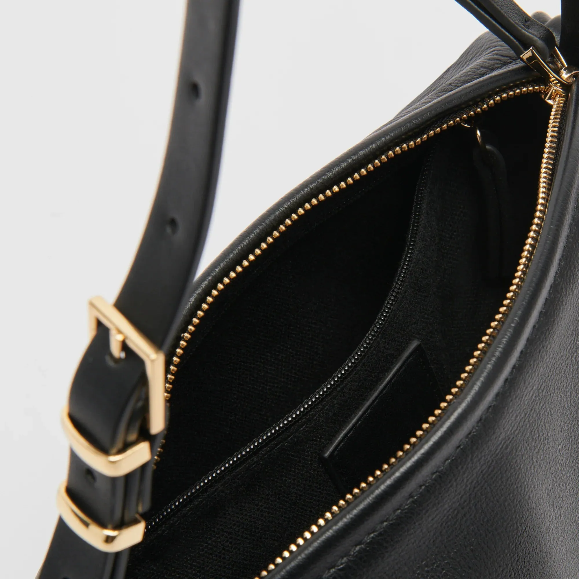 The Livi Shoulder Bag by Dolce Vita - Black Leather