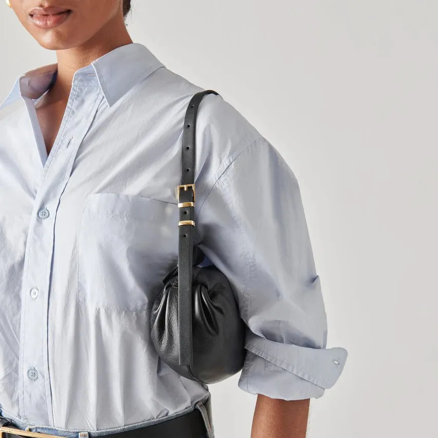 The Livi Shoulder Bag by Dolce Vita - Black Leather